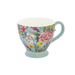 Floral mug with a light blue background on a white background