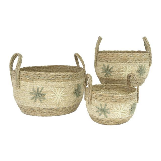 Set of three woven baskets with floral patterns on a white background