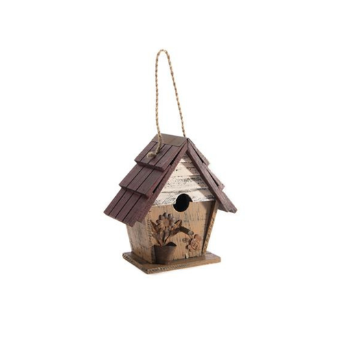 Wooden birdhouse with a brown roof on a white background