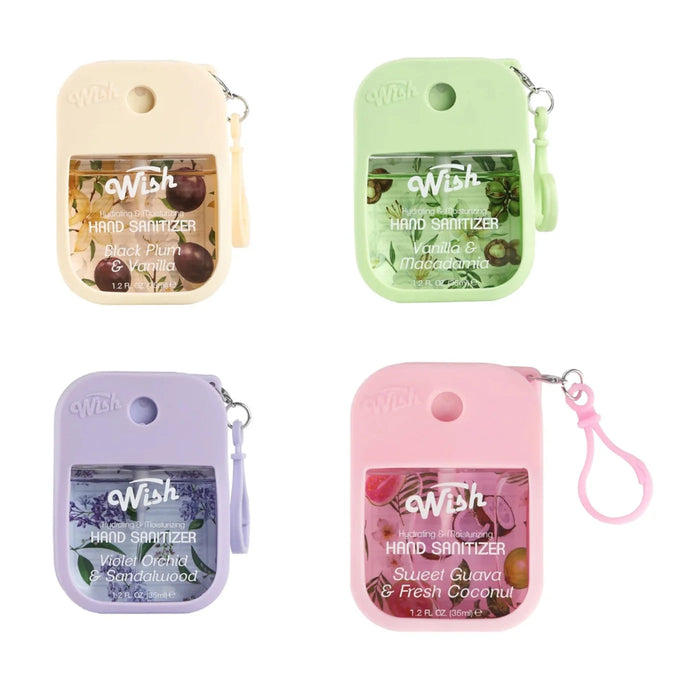 Four small handheld hand sanitizers in different colors with visible branding on a white background.