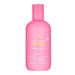 Pink bottle of Lee Stafford 'For the Love of Curls' conditioner on a white background