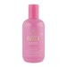 Pink bottle of Lee Stafford 'For the Love of Curls' shampoo on a white background