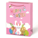 Pink Easter gift bag with bunny, eggs, and 'Happy Easter' text on a white background