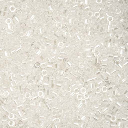 Close-up of small white beads on a light gray background