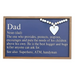 Framed navy wall sign with the definition of “Dad,” featuring white lettering, wood bead detail, and a white heart accent.