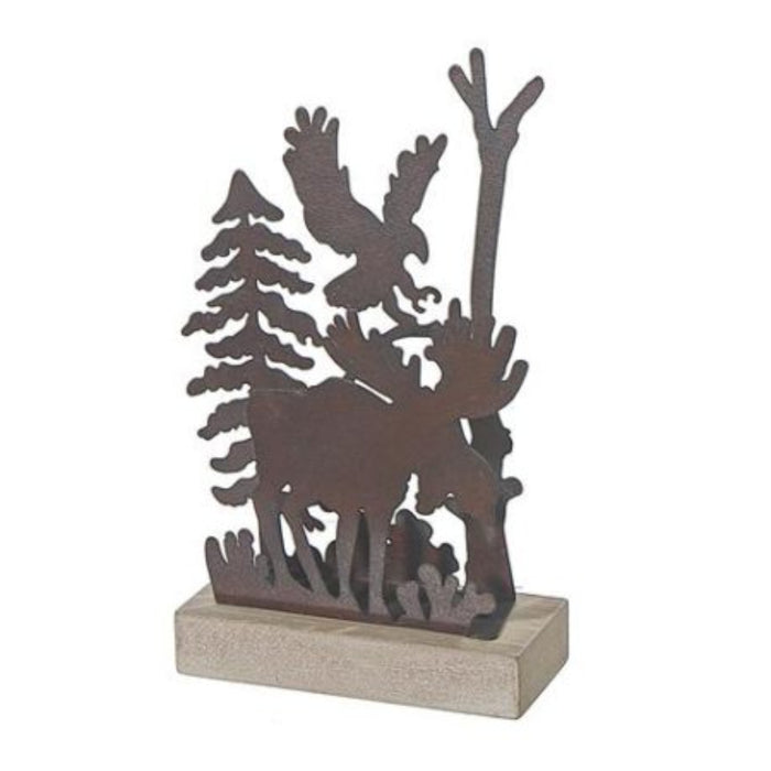 Decorative metal sculpture of a moose and an eagle with trees on a wooden base.
