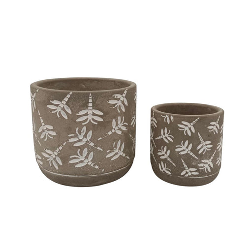 Two ceramic planters with white floral patterns on a white background