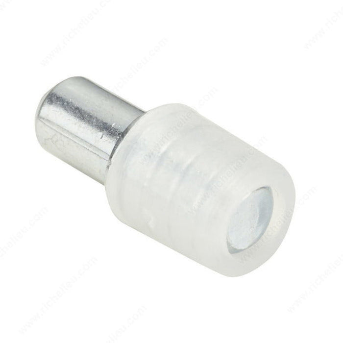White plastic fitting with metal component on a white background