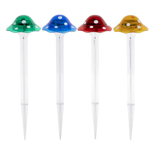 Four colorful mushroom-shaped garden stakes on a white background