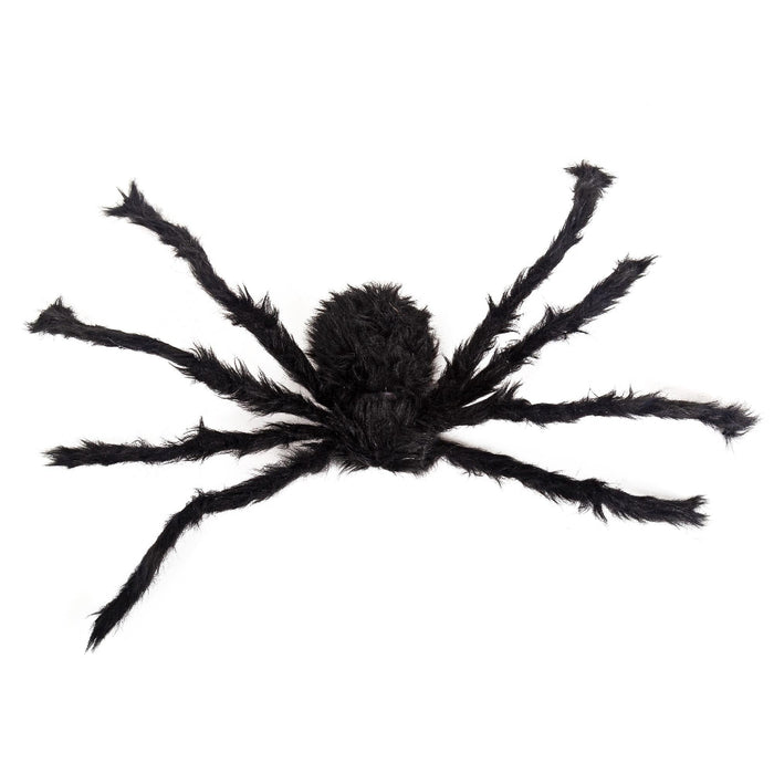 A black fuzzy spider decoration or toy shown against a plain white background.
