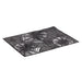 A rectangular black placemat featuring a repeating white spiderweb pattern, shown on a plain white background.