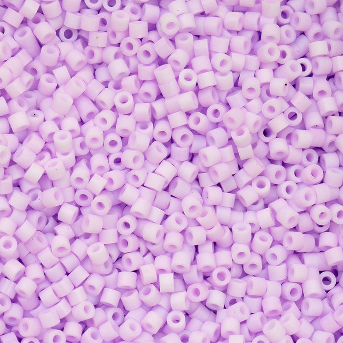 Close-up of purple beads on a purple background