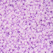 Close-up of purple beads on a purple background