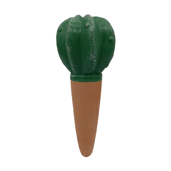 Green cactus-shaped bottle stopper on a white background