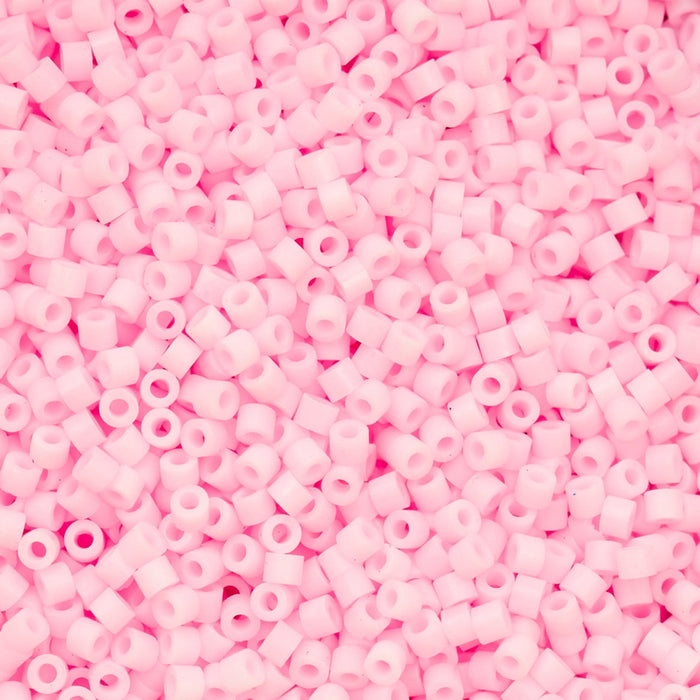 Close-up of pink beads on a pink background