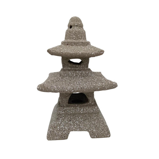 Stone-like decorative lantern on a white background