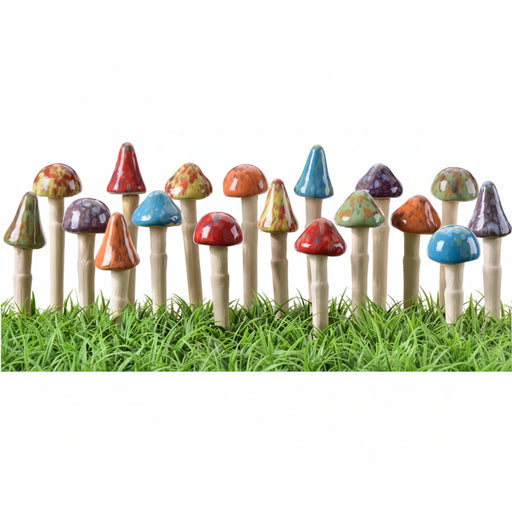 Colorful toy mushrooms on grass with a white background