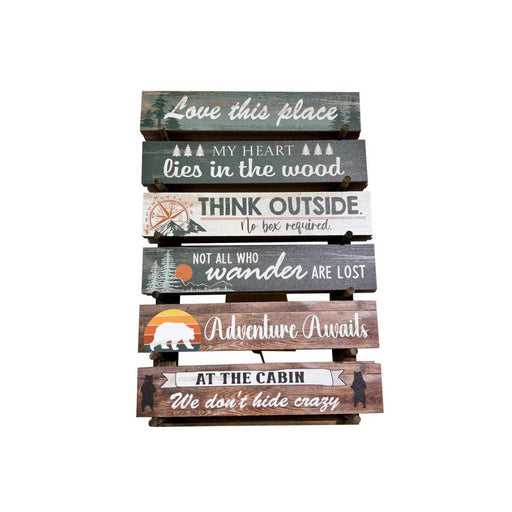Stack of wooden signs with motivational phrases on a white background