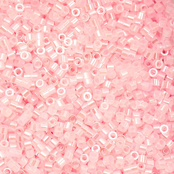 Close-up of pink beads on a pink background