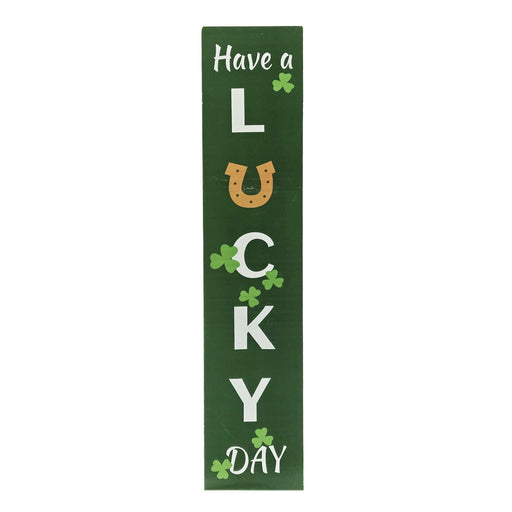 Decorative sign with 'Have a Lucky Day' text on a green background