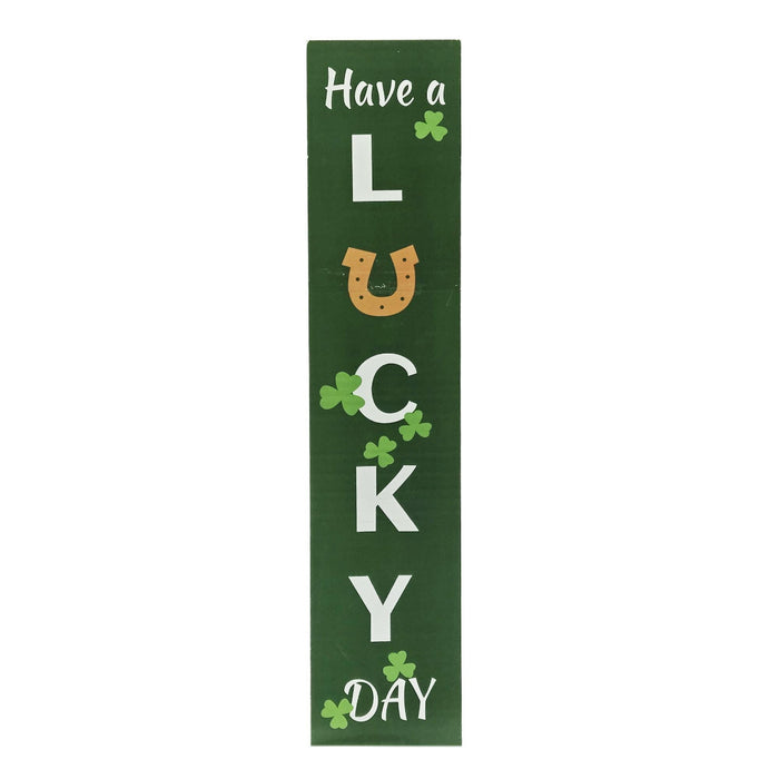 Decorative sign with 'Have a Lucky Day' text on a green background