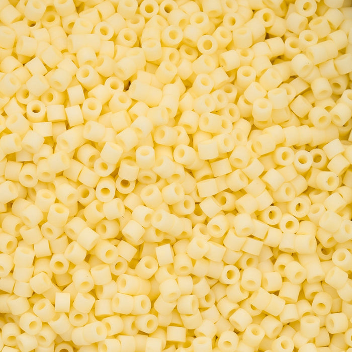 Close-up of a pile of small yellow beads