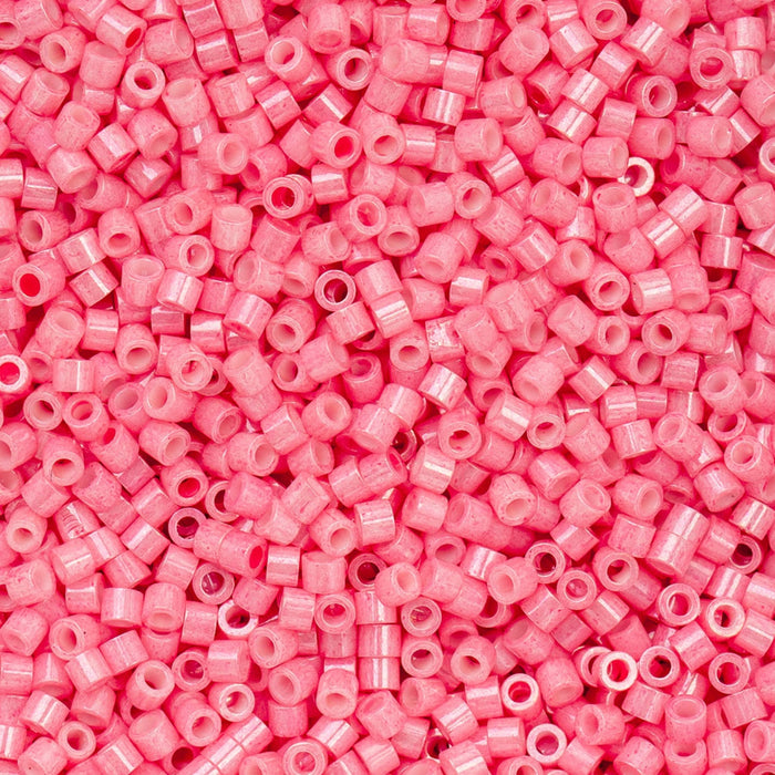 Close-up of pink beads with a pink background