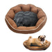 Brown pet bed with gray cushion and a pug inside on a white background