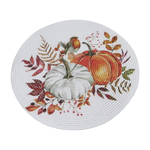 An oval white woven placemat featuring a detailed autumn-themed illustration with two pumpkins, colorful fall leaves, berries, and a small bird, shown on a plain white background.