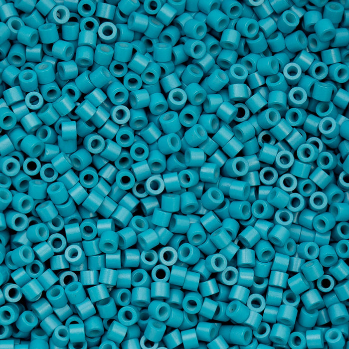 Turquoise plastic beads densely packed together