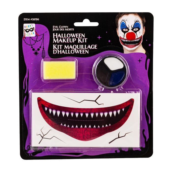 Halloween makeup kit in blister packaging, featuring a red and black fake tooth grin mask, a yellow sponge, and a round makeup palette with blue, white, and black colors. The packaging is black and purple with text reading 'Halloween Makeup Kit' and a picture of an evil clown face.