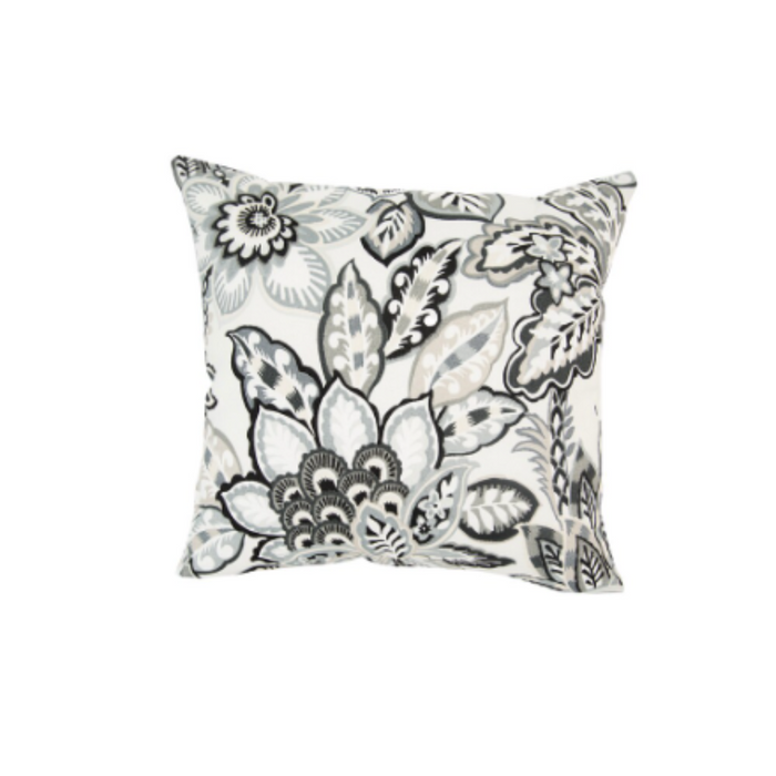 Decorative pillow with black and white floral pattern on a white background