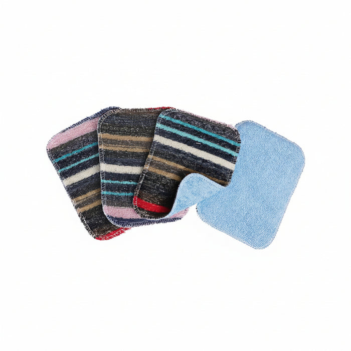 Four rectangular cleaning pads or cloths arranged in a fan on a white background. Three pads show a striped pattern in navy, beige, white, pink, and red, while the front pad is light blue and appears to be the reverse side or a different variant.