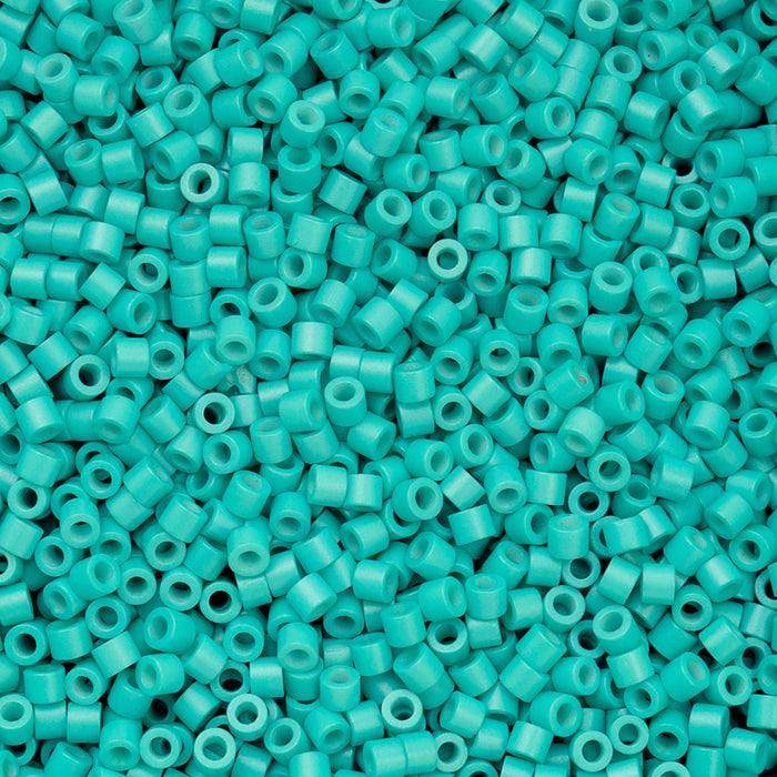 Turquoise plastic beads densely packed together