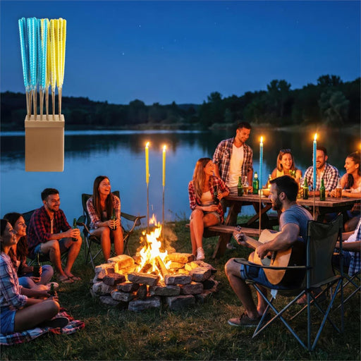 Group of people around a campfire by a lake at night, with glowing candles inset.