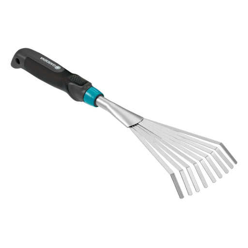Gardening tool with metal teeth and black handle on a white background