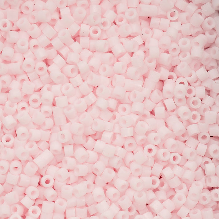 Close-up of pink plastic beads with a soft focus