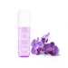 Purple bottle with floral design on a white background
