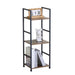 Three-tiered shelf with books and decorative items on a white background