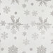A rectangular placemat with a repeating pattern of silver snowflakes on a textured off-white background.