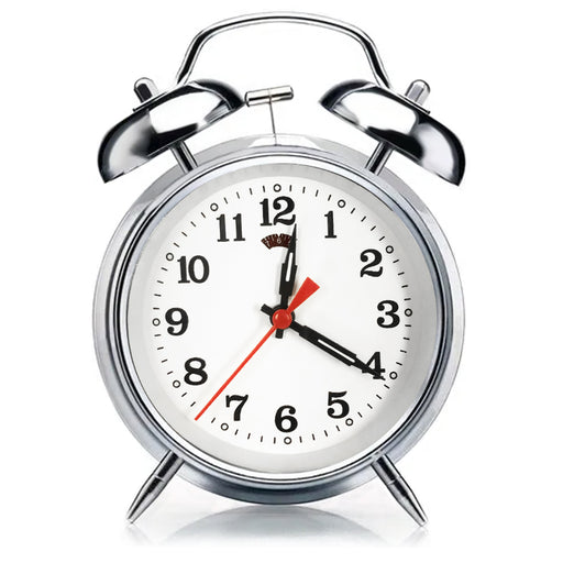 Silver alarm clock with a white face on a white background
