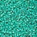Turquoise plastic beads densely packed together