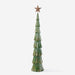 A rustic, tiered metal Christmas tree decoration in a distressed green finish with a bronze star topper, shown against a plain light gray background.