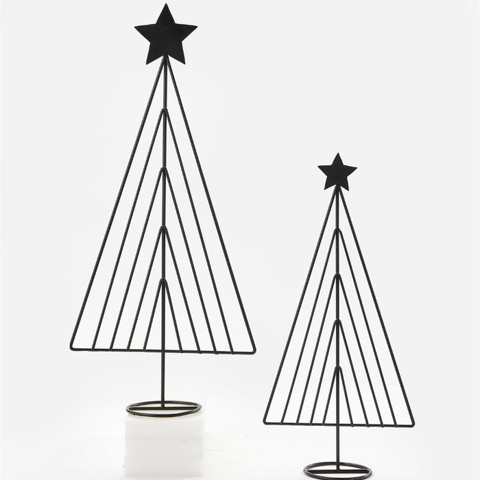 Two minimalist black metal wire Christmas tree decorations with star toppers, displayed on a clean white background with one on a small white pedestal.