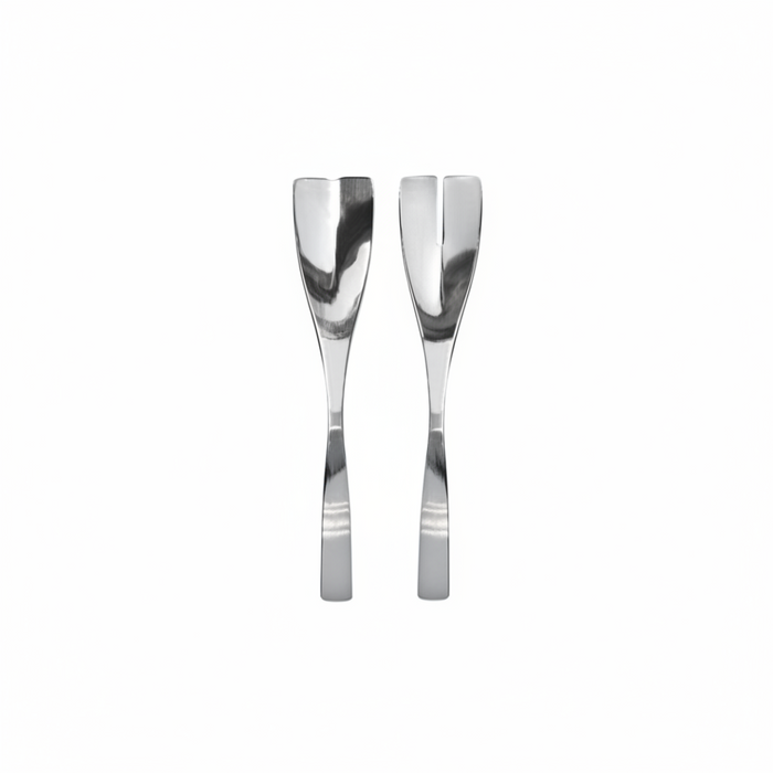 Two silver salad servers on a white background