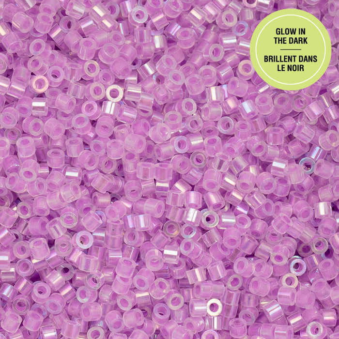 Purple glow-in-the-dark beads with a green label on a purple background