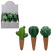 Green cactus-shaped items on terracotta pots with a display box in the background.