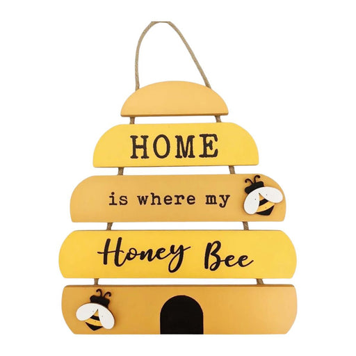 Yellow wooden sign with text 'HOME is where my Honey Bee' on a white background