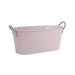 Pink metal bathtub with rope handles on a white background
