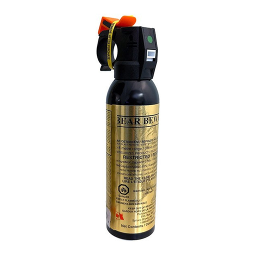 Bear spray with black and gold label on a white background